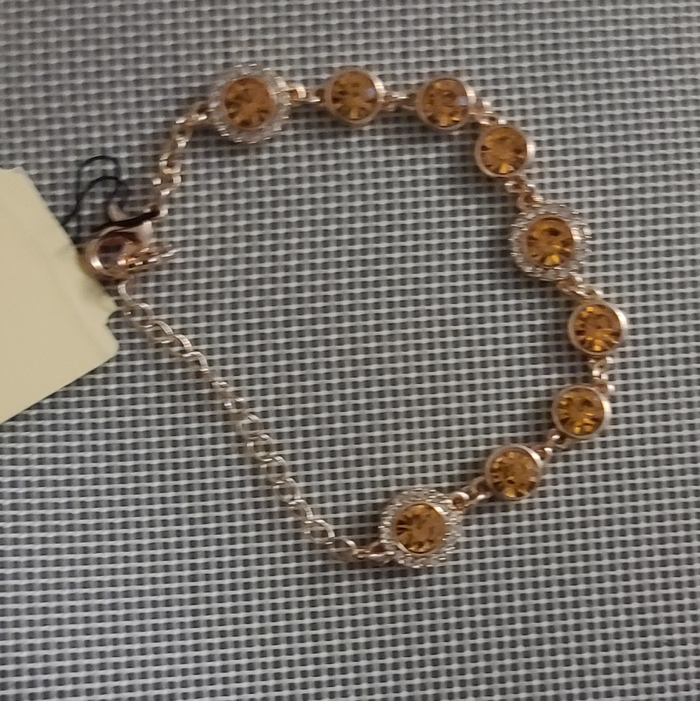 Monet crystal lobster clasp gold tone  bracelet